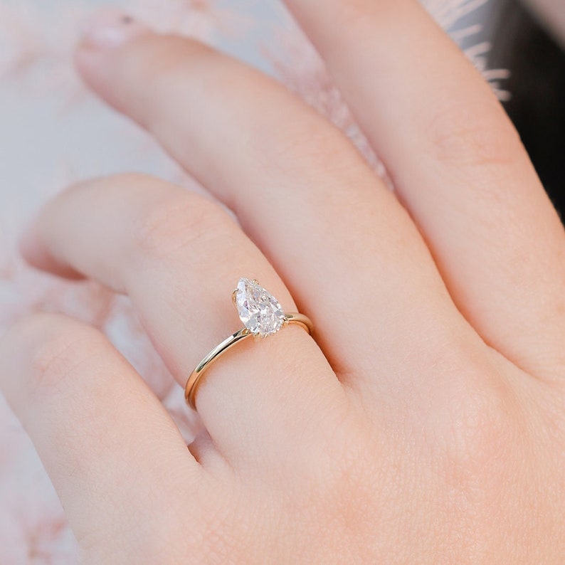 pear-hidden-halo-f-vs1-diamond-engagement-ring