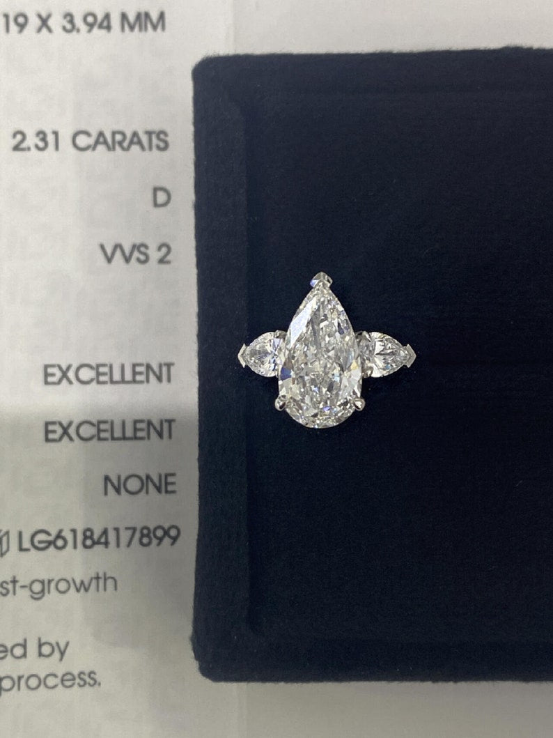 2.0ct-3.0ct Pear Cut Lab Grown Diamond Three Stone Engagement Ring