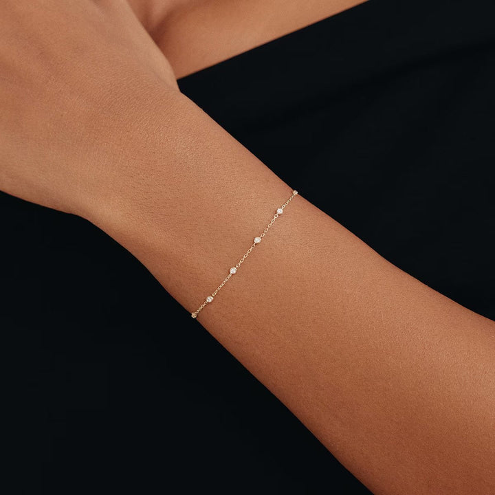 Bezel Set Round Cut Lab Grown Diamond Bracelet in Gold