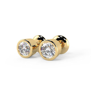 Bezel Set Round Cut Moissanite Diamond Stud Earrings in Yellow Gold