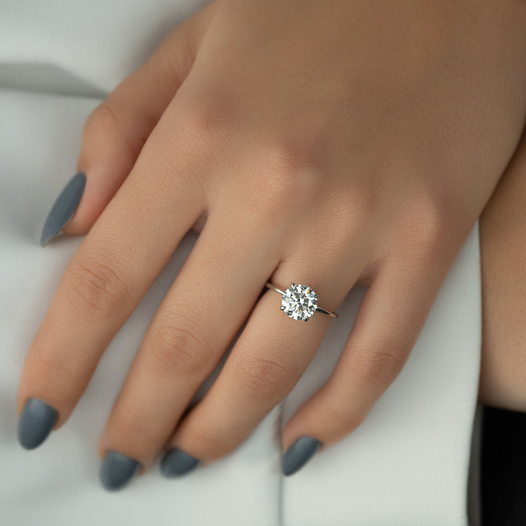 round-f-vs1-cvd-diamond-hidden-halo-engagement-ring