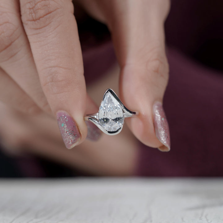 platinum pear solitaire, white gold lab diamond, yellow gold pear ring, vvs1 lab diamond, elongated pear cut, 2.0ct pear shape, teardrop bypass setting, minimalist pear ring, hand-polished lab diamond.