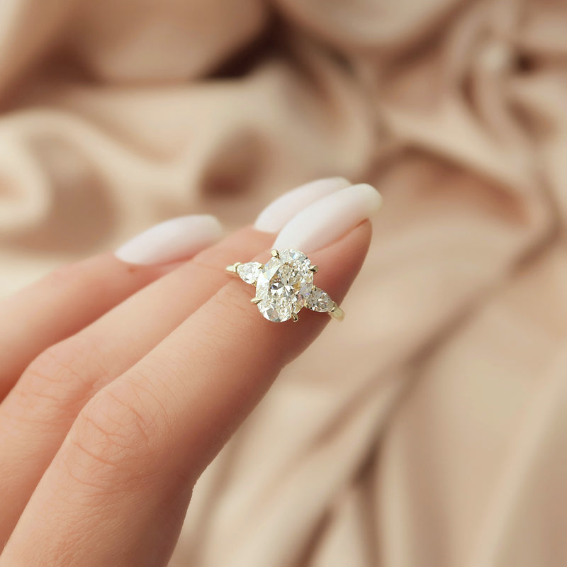 3.50CT Oval Lab Grown E/VVS2 Diamond Three Stone Engagement Ring