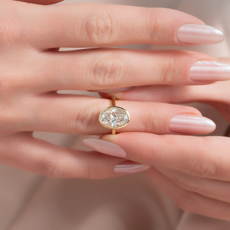 4.50CT Oval Lab Grown E/VVS1 Diamond Bezel Set Engagement Ring