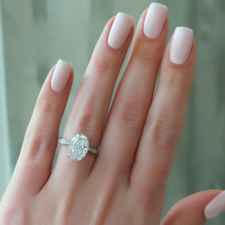 2.0CT Oval Lab Grown E/VVS1 Diamond Twisted Pave Engagement Ring