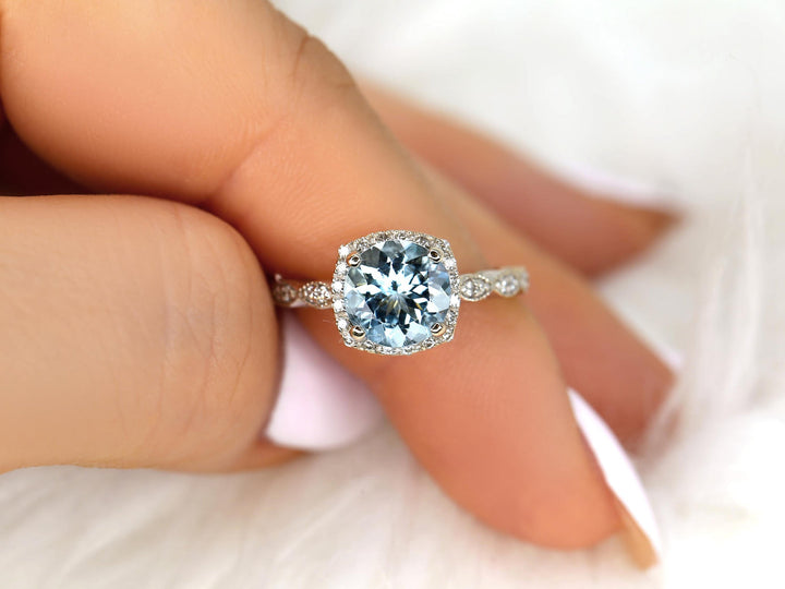 Aquamarine Ring
Round Cut Aquamarine
Cushion Halo Ring
Lab Grown Diamond
