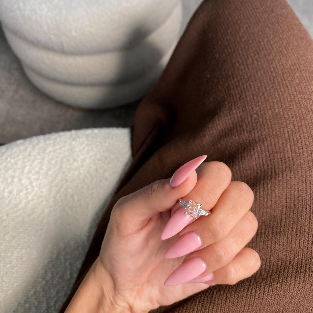2ct Pink Cushion with Cadillac Side StonesLuxury Pink Lab Diamond JewelryVivid Pink Cushion Engagement Ring TrendsModern Pink Three Stone Diamond Ring