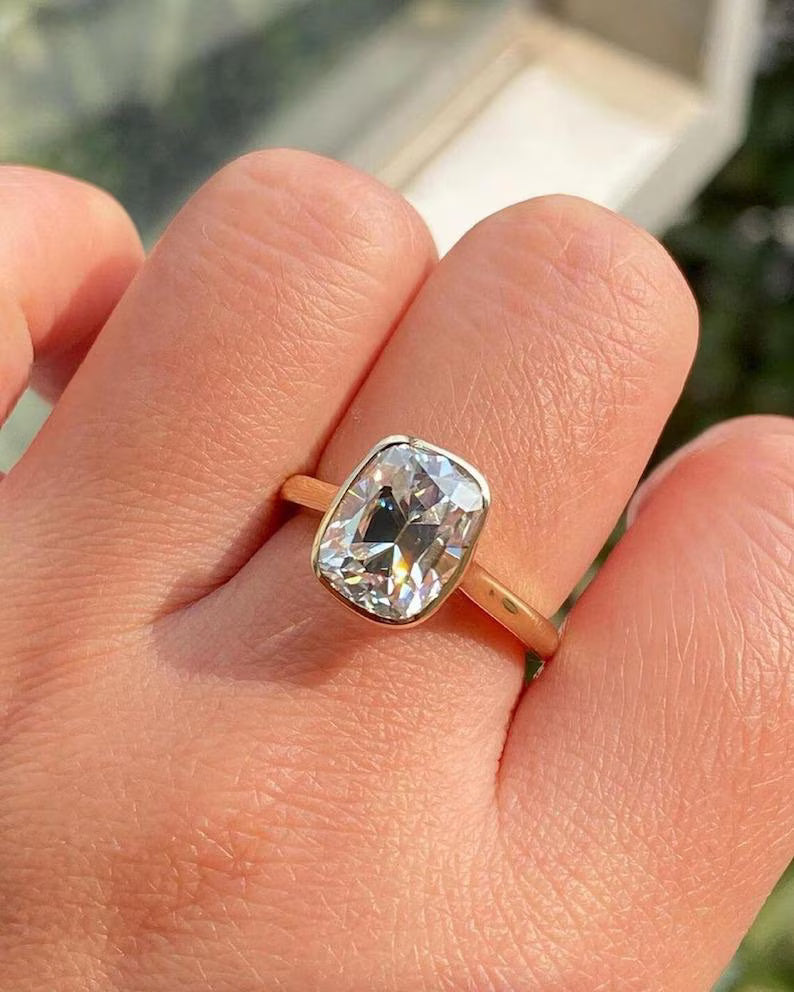 3.0CT Lab Diamond
Old Mine Cut Cushion
Elongated Cushion Ring
E VVS1 Diamond
Lab Grown Diamond

