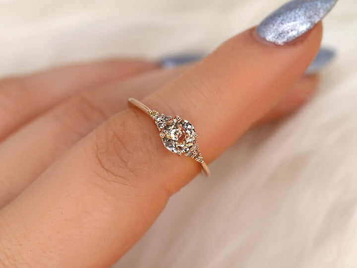 Unique Engagement Ring
1.5 Carat Sapphire
Lab Created Sapphire
Round Cut Diamond
Peach Bridal Jewelry
Champagne Gold Ring
