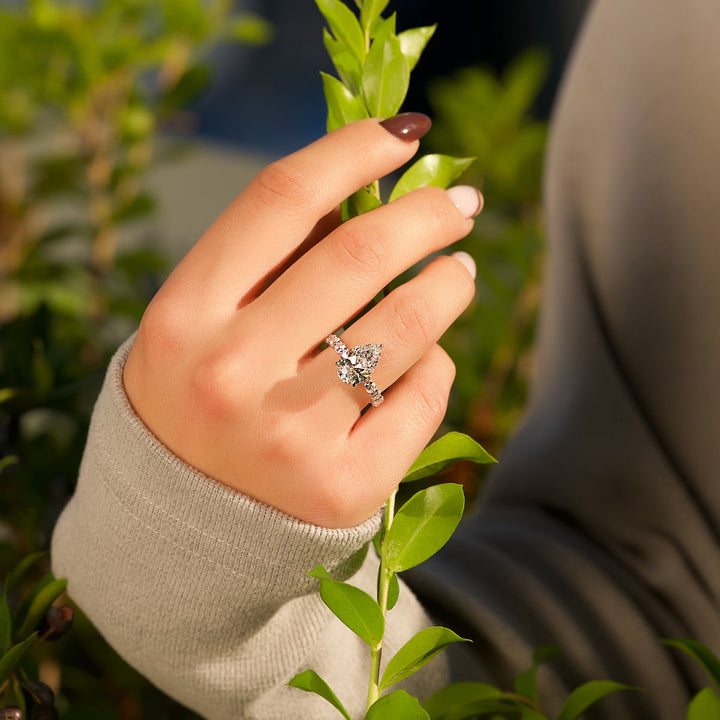 Pear side stone diamond ring, Pear cathedral diamond ring, Pear bezel diamond ring, Pear tension set diamond ring, 