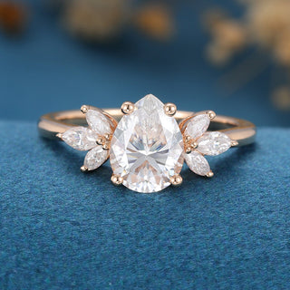 1-0-ct-pear-shaped-moissanite-cluster-engagement-ring-14