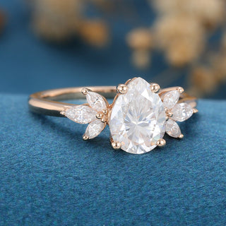 1-0-ct-pear-shaped-moissanite-cluster-engagement-ring-16