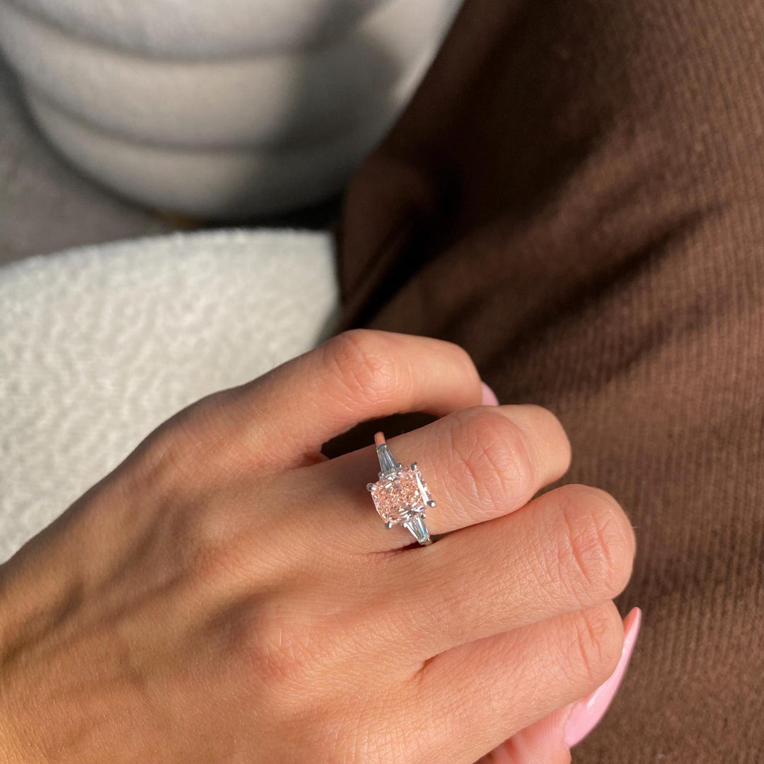 Rare Vivid Pink Lab Diamond RingPink Cushion Diamond Ring on HandDreamy Pink Cushion Trilogy RingCushion Cut Pink Diamond Rose GoldBold Pink Diamond Engagement Ring2ct Pink Cushion with Cadillac Side StonesLuxury Pink Lab Diamond Jewelry