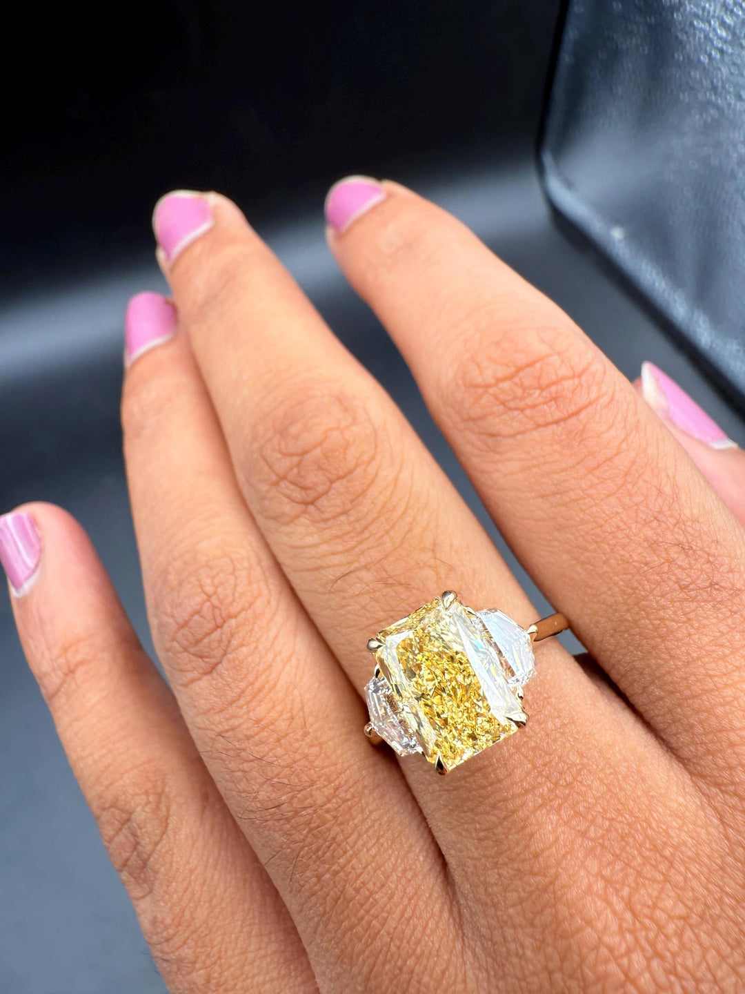 3 Carat Radiant Diamond on HandModern Three Stone Radiant DesignYellow Radiant Ring with Pear Side StonesCelebrity Style Yellow Diamond RingRadiant Cut Cathedral Three Stone Ring