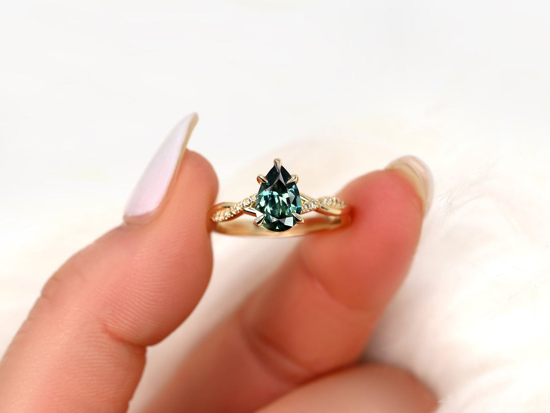 Teal Sapphire Ring
Pear Cut Sapphire
Lab Grown Diamond
