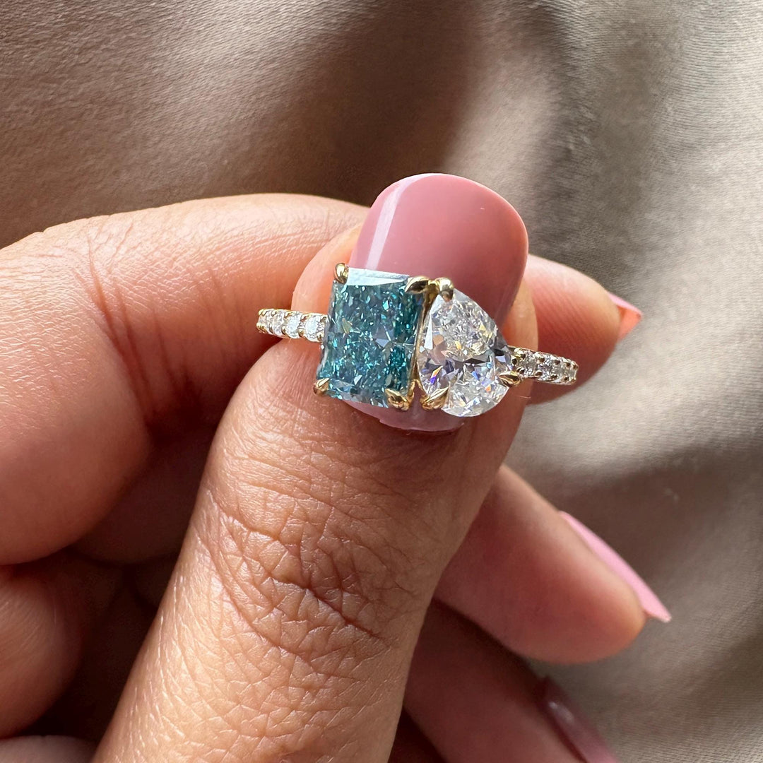 blue diamond ring, radiant cut diamond, pear shaped diamond, two stone diamond ring, ethical diamond ring,