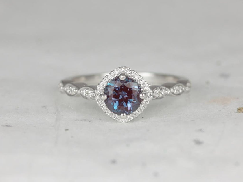 blue diamond halo ring round
round halo blue ring
blue gemstone halo ring
classic halo blue engagement ring
round blue stone engagement ring
