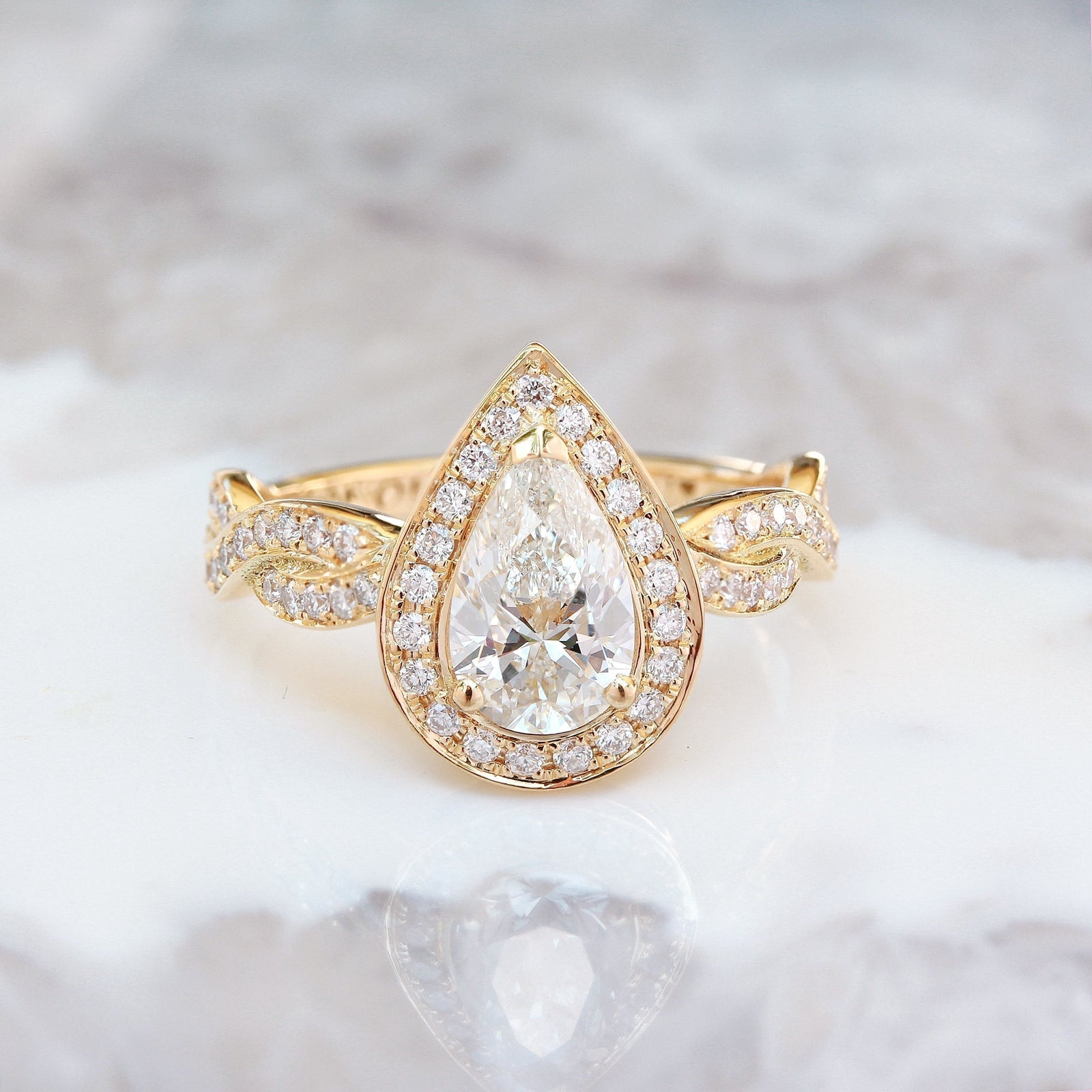 pear-f-vs1-diamond-halo-pave-engagement-ring