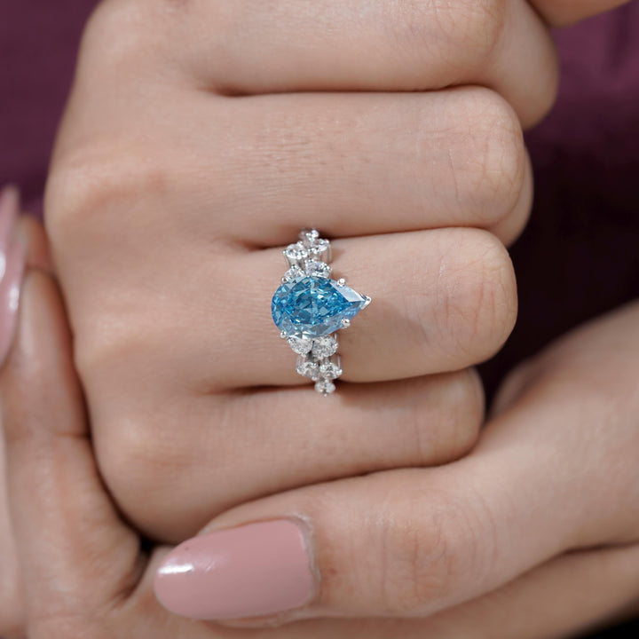 custom blue diamond jewelry, bespoke cluster ring, luxury lab diamond engagement, GIA certified lab blue diamond, ethical bridal jewelry.