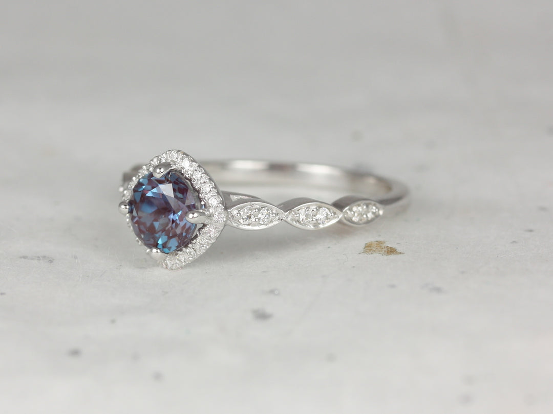 custom round blue halo engagement ring