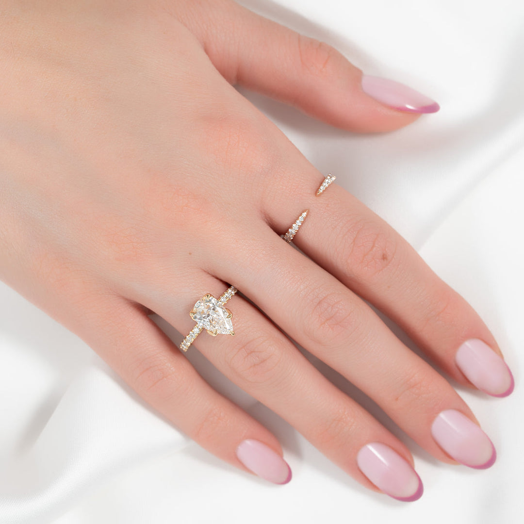 Pear sophisticated diamond ring, Pear trendy diamond ring, Pear fashionable diamond ring, Pear versatile diamond ring, Pear ethical diamond ring, Pear sustainable diamond ring, Pear conflict-free diamond ring, 