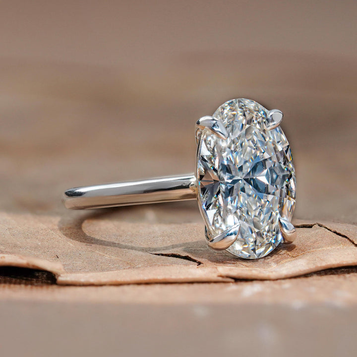 brilliant cut oval, simple oval ring, eco-friendly bridal, teardrop-style oval, minimal solitaire setting, 4ct lab diamond ring, oval engagement ring, high-carat lab diamond.