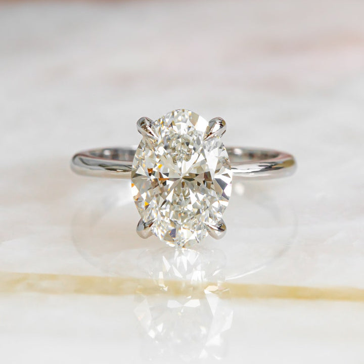 3-05-ct-oval-hidden-halo-f-vs2-diamond-engagement-ring