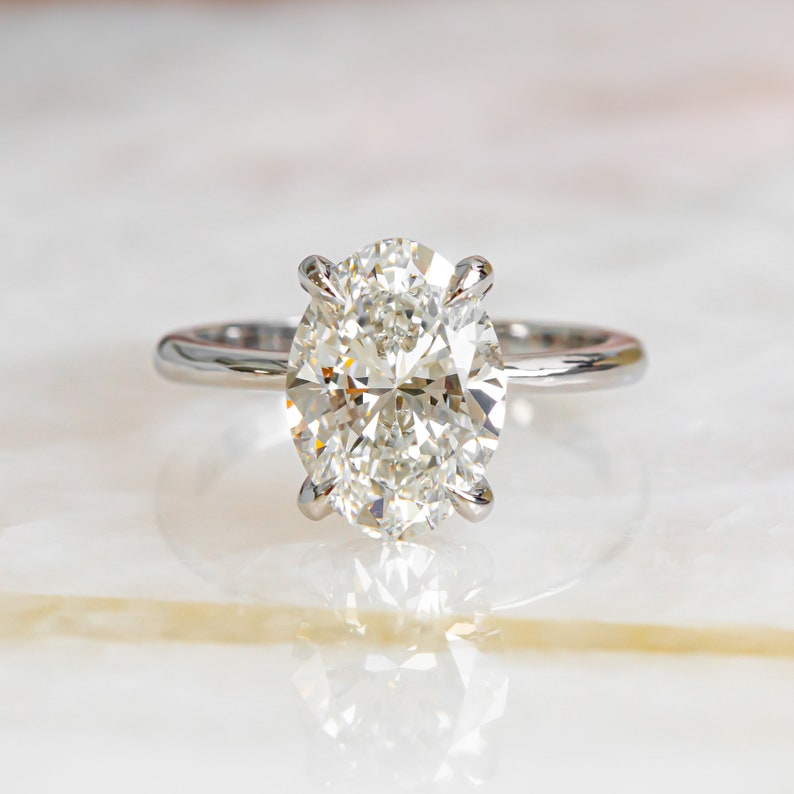3-05-ct-oval-hidden-halo-f-vs2-diamond-engagement-ring