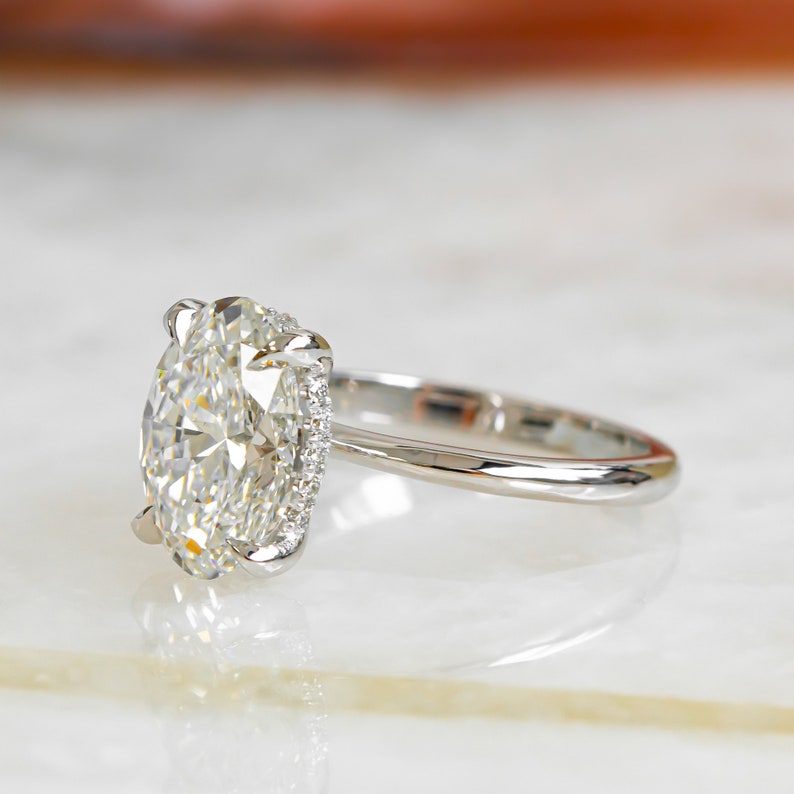 oval-hidden-halo-f-vs2-diamond-engagement-ring