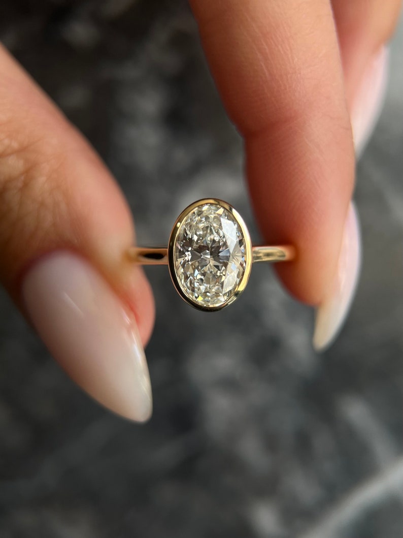 2-0-ct-oval-bezel-solitaire-cvd-f-vs1-diamond-engagement-ring