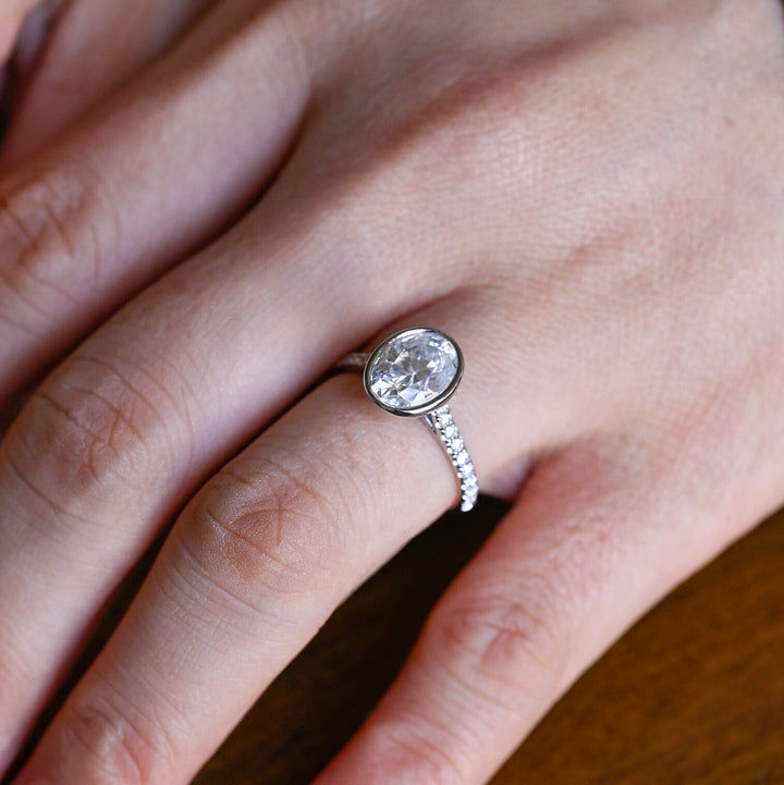 2.0ct-3.0ct Bezel Set Oval Cut Lab Grown Diamond Pave Engagement Ring