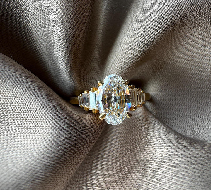 2.0CT Oval Step Cut Lab Made Diamond Engagement Ring - Graduated Baguette Setting