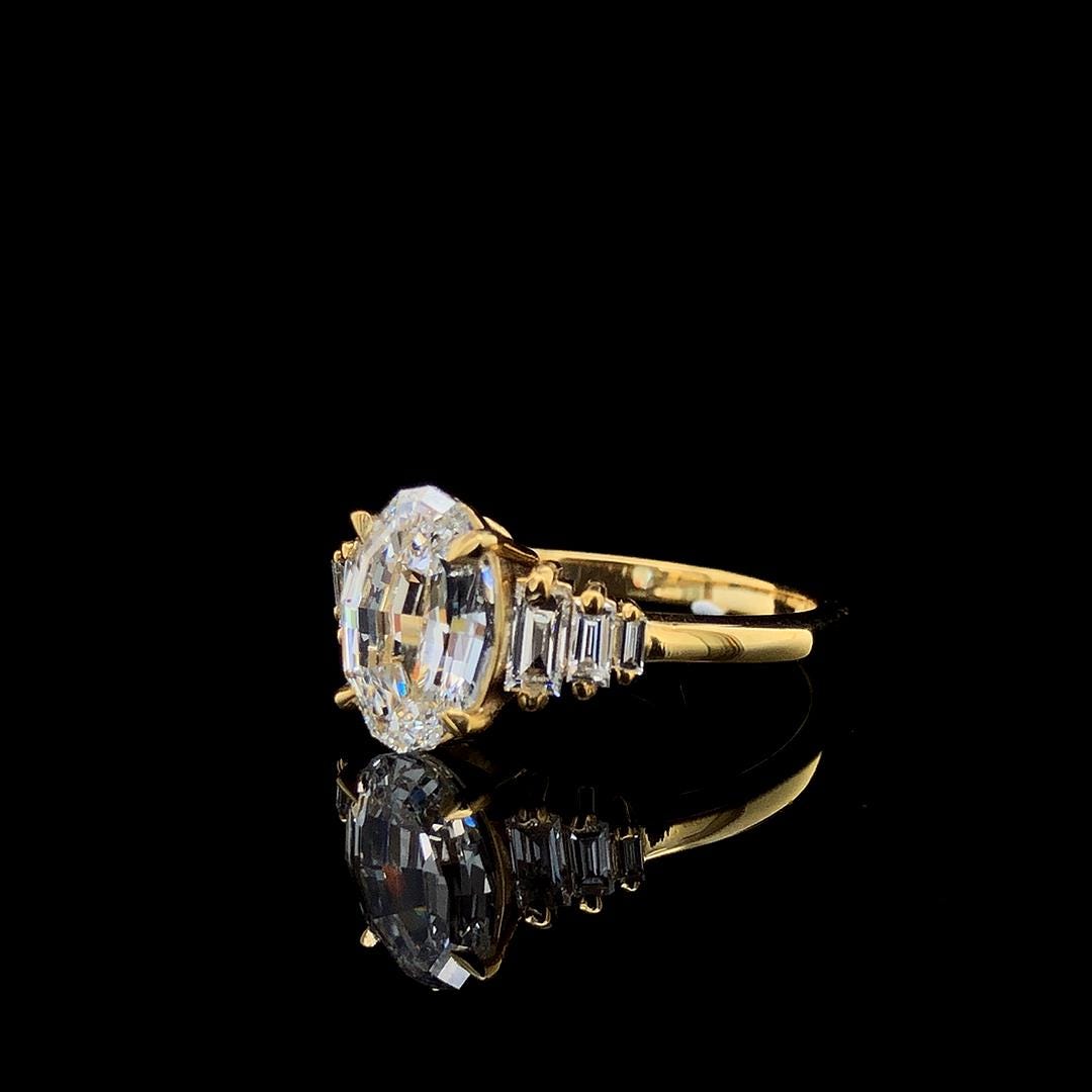 2.0CT Oval Step Cut Lab Made Diamond Engagement Ring - Graduated Baguette Setting