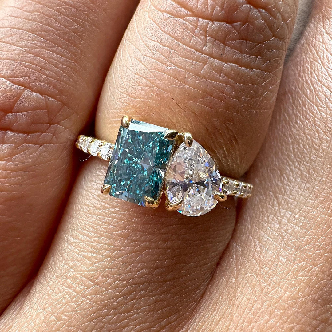 fancy blue diamond, radiant and pear duo, blue lab diamond, white lab diamond, mixed shape diamond ring