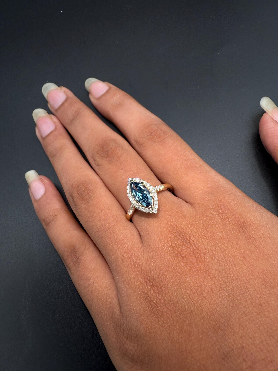 modern oval halo engagement ring
