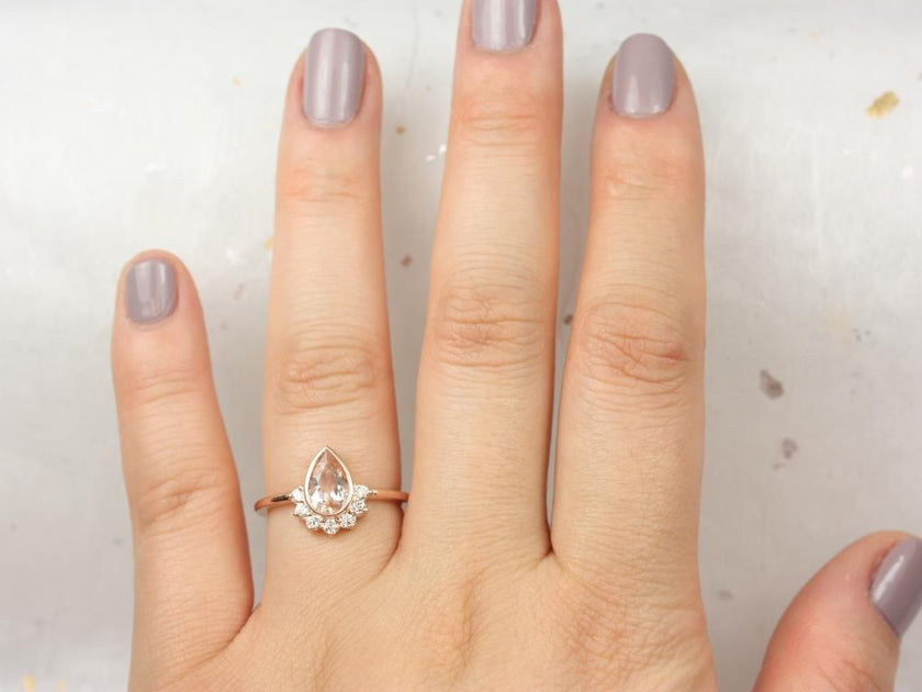 pear peachy pink engagement ring
pear pink engagement ring
peach pink gemstone engagement ring
pear cut pink sapphire ring
pear shape peach engagement ring
pink diamond pear engagement ring