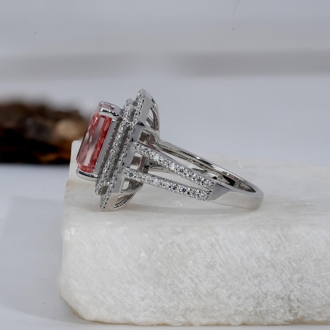 radiant cut pink diamond halo ring
