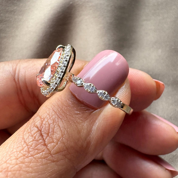 pink and white diamond ring, micro pave engagement ring, fancy vivid pink diamond, pear shaped pink solitaire.
