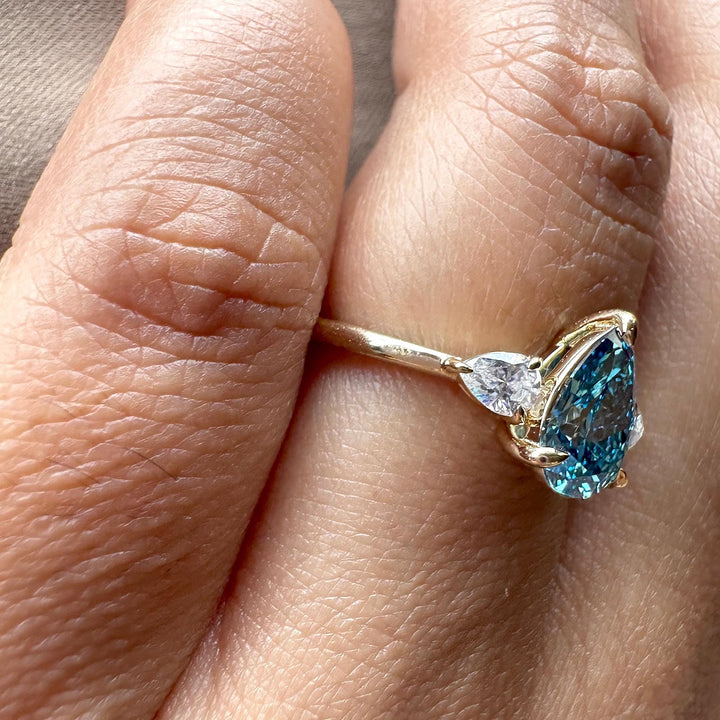  halo engagement ring, IGI certified diamond, coloured diamond ring, lab created blue diamond, trilogy diamond ring, 1.50 carat diamond ring.