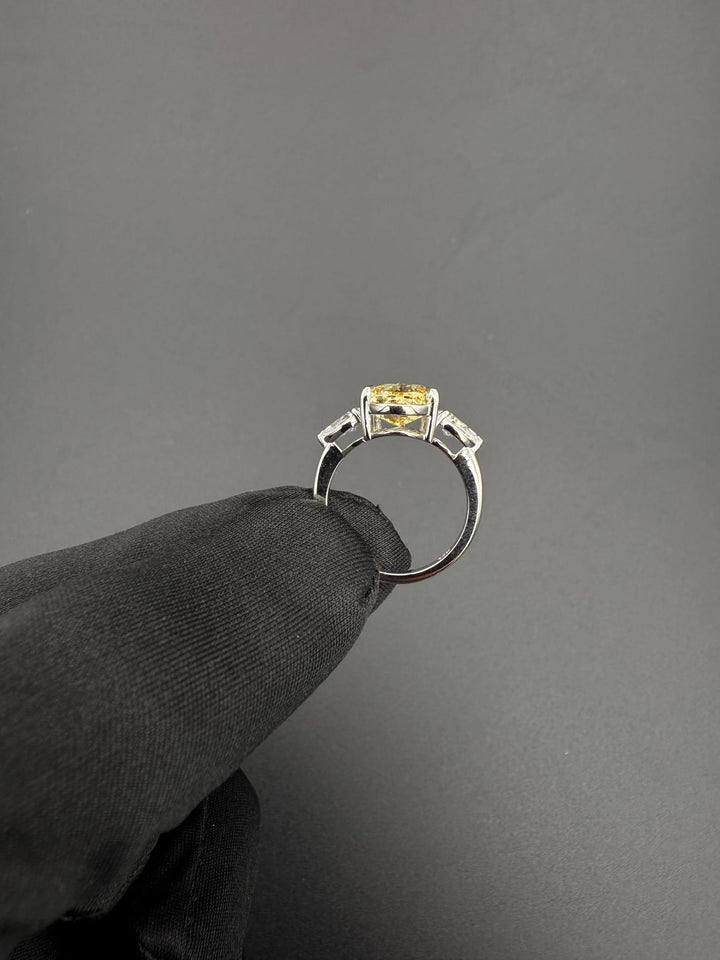 three stone pear cut diamond ring
