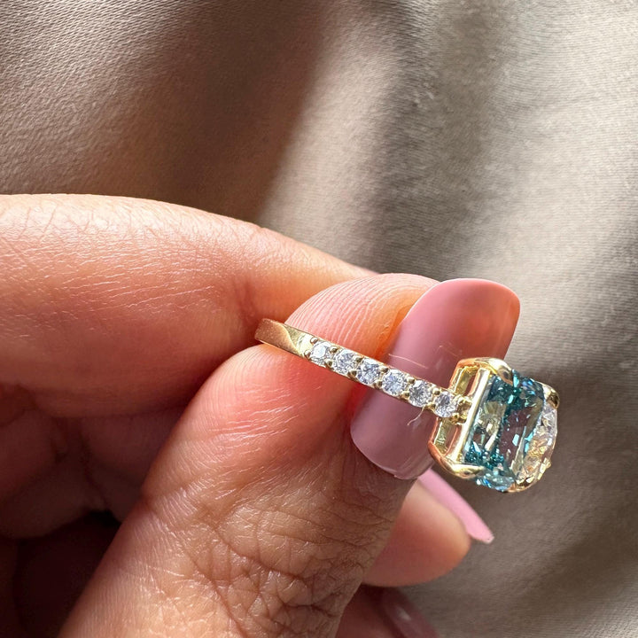 platinum two stone ring, blue radiant and white pear, fancy vivid blue diamond, vvs1 lab diamond, high quality lab diamond, modern bypass setting, unique bridal jewelry.
