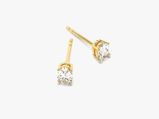 Oval Cut Moissanite Stud Diamond Earrings in Yellow Gold